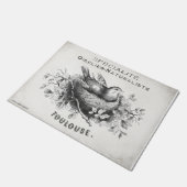 Het Franse doormat met vogel in het nest. Deurmat (Schuin)