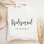Het gepersonaliseerde Manuscript van de Handtekeni Tote Bag<br><div class="desc">Deze eenvoudige,  elegante canvas tas kenmerkt het woord "bridesmaid"in het handschrift van de houtskool grijs handschrift. Pas het aan met haar naam in sans serif doopvont. Maakt een perfect bruidsmeisje cadeau!</div>