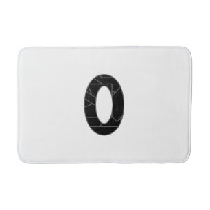 Het getal nul (0) in zwart badmat