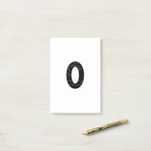 Het getal nul (0) in zwart post-it® notes (Op bureau)