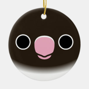 Het gezicht van een blauw gemaskerde lovebird keramisch ornament
