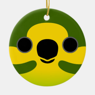 Het gezicht van een gele papegaai keramisch ornament