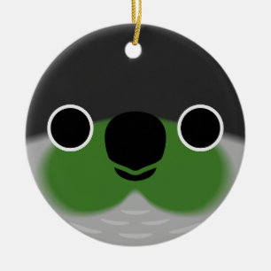 Het gezicht van een groene wang parkiet keramisch ornament