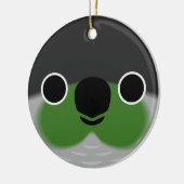 Het gezicht van een groene wang parkiet keramisch ornament (Links)