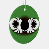 Het gezicht van een kastanje-fronted ara keramisch ornament (Rechts)