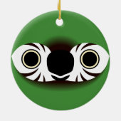 Het gezicht van een kastanje-fronted ara keramisch ornament (Achterkant)