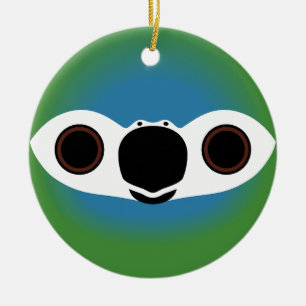 Het gezicht van een roodbuikara keramisch ornament