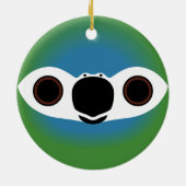 Het gezicht van een roodbuikara keramisch ornament (Achterkant)