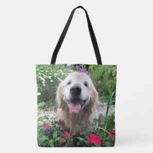 Het glimlachen van de gouden riever onder de bloem tote bag