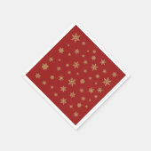 Het Goud van het Ontwerp van sneeuwvlokken op Rood Servet (Hoek)