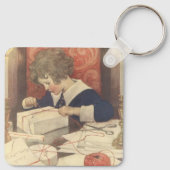 Het inpakken van kerstcadeaus, Jessie Willcox Smit Sleutelhanger (Achterkant)