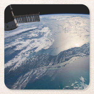 Het internationale ruimtestation boven de Atlantis Kartonnen Onderzetters