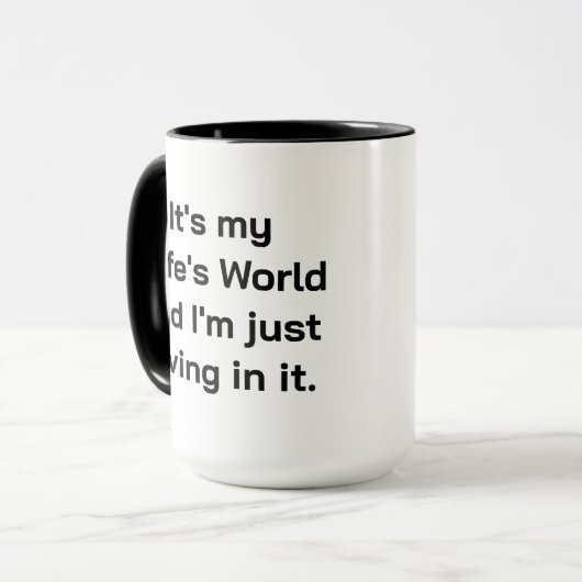 Het is de wereld van mijn vrouw mok (Voorkant links)