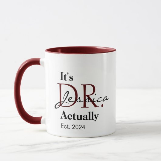 Het is Dr. [Custom Naam] Eigenlijk Opgericht Jaar Mok (Links)