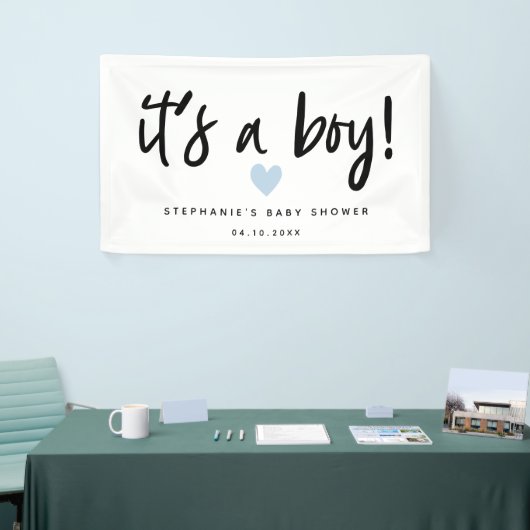 het is een baby shower met een simpel blauw hart spandoek (Beurs)