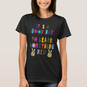 Het is een goede dag om iets nieuws te leren over t-shirt