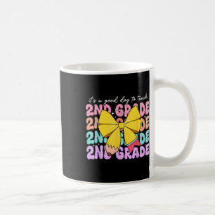 Het is een goede dag om les te geven aan een 2e kl koffiemok