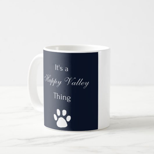 Het is een Happy Valley Thing Mok (Voorkant links)