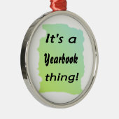 Het is een jaarboek. metalen ornament (Rechts)