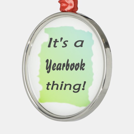 Het is een jaarboek. metalen ornament (Links)