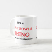 Het is een 'Lawn Bowls' ding, je zou het niet begr Koffiemok (Voorkant links)