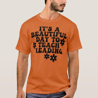 Het is een mooie dag om het lezen te leren 1 t-shirt