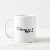 Het is een wonder van een dag. koffiemok (Links)