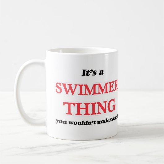 Het is en zwemmen, je zou het niet begrijpen koffiemok (Links)