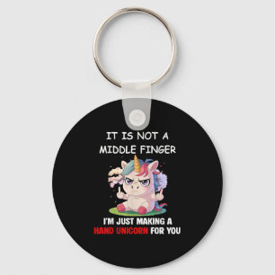 Het is geen middelvinger, ik maak gewoon een hand sleutelhanger
