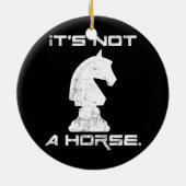 Het is geen paardenschotel. keramisch ornament (Achterkant)