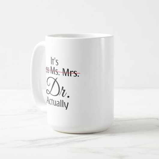 Het is Miss Mrs Dr. Eigenlijk Phd Afstuderen. Koffiemok (Voorkant links)