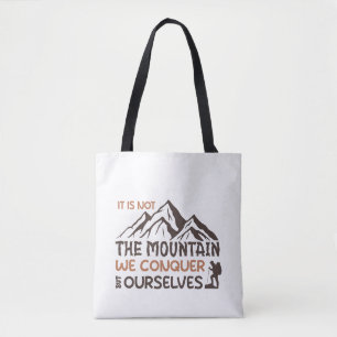 het is niet de berg die we overwinnen maar onszelf tote bag
