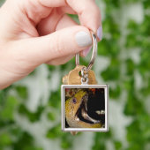 Het kwetsen en intimideren van de mond van een gee sleutelhanger (Hand)