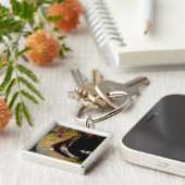 Het kwetsen en intimideren van de mond van een gee sleutelhanger (Zijkant)