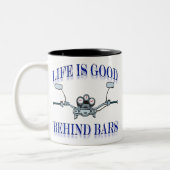 Het leven achter de bars is goed tweekleurige koffiemok (Links)