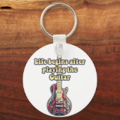 Het leven begint na het spelen van de gitaar. Acht Sleutelhanger (Voorkant)