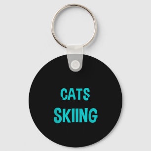 Het leven gaat niet over katten en skiën, wintersn sleutelhanger