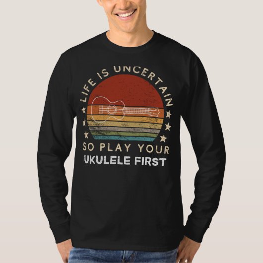 Het leven is onzeker Speel Ukulele Eerste Grappig T-shirt (Voorkant)