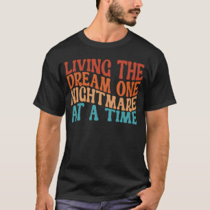 Het leven van de droom op een nachtmerrie t-shirt