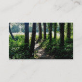 Het licht van de ochtend verlicht een bospad visitekaartje (Achterkant)