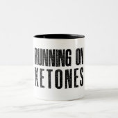 Het lopen op Ketones Coffee Mok (Center)