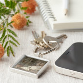 Het onderwijs van Achilles Sleutelhanger (Zijkant)