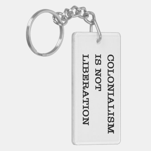 Het ontwaken: kolonialisme is geen bevrijding sleutelhanger (Voorkant Links)