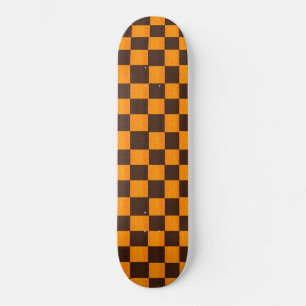 het patroon van bruine en goudcheques, persoonlijk skateboard