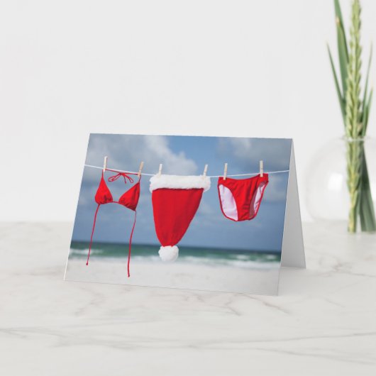 Het pet en de bikini van de kerstman op een feestdagen kaart (Voorkant)