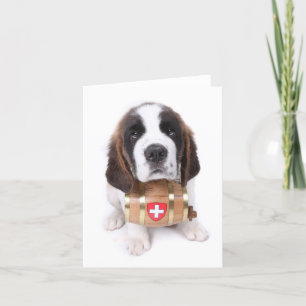 Het puppy van de sint-bernard met een de notakaart kaart