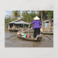 Het roeien van een boot in Mekong Delta, Vietnam