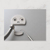 Het skelet waarvoor een tandheelkundige behandelin briefkaart (Voorkant)