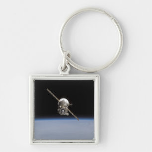 Het Soyuz TMA-11-ruimtevaartuig boven de aarde Sleutelhanger