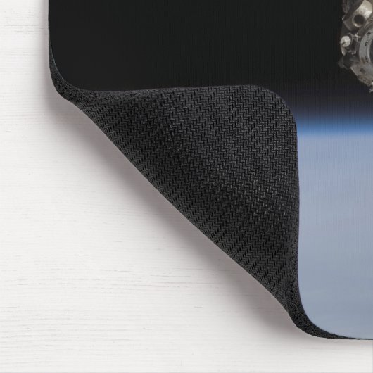 Het Soyuz TMA-11-ruimtevaartuig boven het aardoppe Muismat (Hoek)